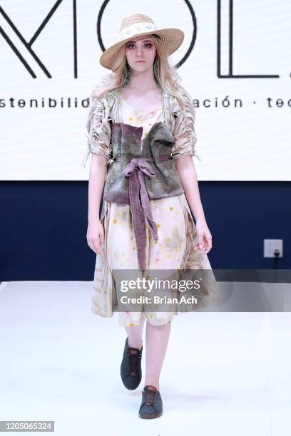 Model walks the runway wearing TARPUI during NYFW Powered By hiTechMODA on February 08, 2020 in New York City.