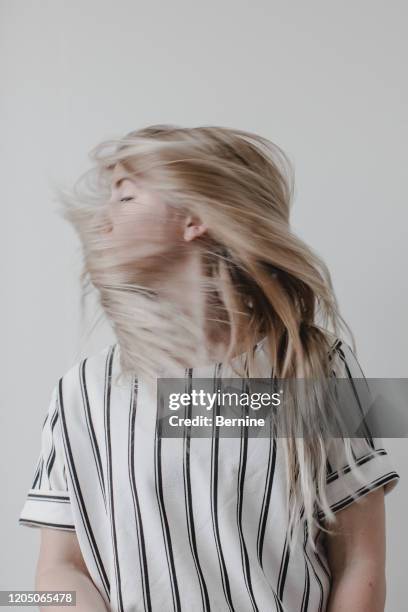 young woman with hair covering face - obscured face ストックフォトと画像