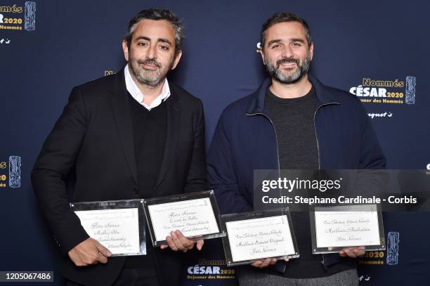 Eric Toledano and Olivier Nakache attend the Cesar 2020 - Nominee Luncheon At Le Fouquet's on February 09, 2020 in Paris, France.