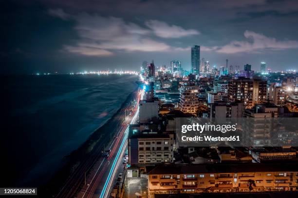 srilanka, western province, colombo, high angle view of coastal city at night - sri lanka skyline stock pictures, royalty-free photos & images