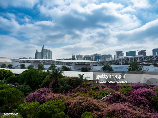 portugal, lisbon, clouds over garo do oriente train station - parque das nações stock pictures, royalty-free photos & images