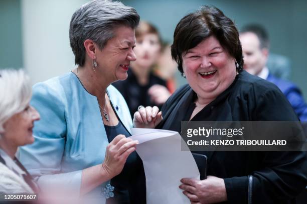 Belgian Health, Social Affairs, Asylum Policy and Migration minister Maggie De Block speaks with EU commissioner for Home Affairs Ylva Johansson...