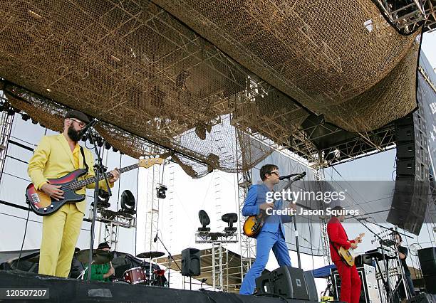 Tim Nordwind, Dan Konopka, Damian Kulash and Andy Ross of OK Go perform during the 2011 Kanrocksas Music Festival at Kansas Speedway on August 6,...