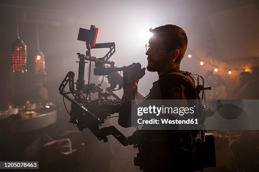 Cameraman at work on movie set Cameraman at work on movie set