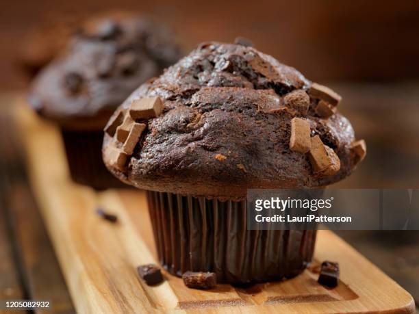 double chocolate chunk muffins - muffin stock pictures, royalty-free photos & images