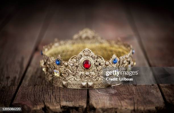 easter jesus gold jeweled kings crown on an old wood background - king royalty stock pictures, royalty-free photos & images