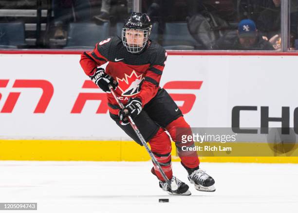 Jocelyne Larocque of Canada skates with the puck during women's hockey action in Game of the 2020 Rivalry Series against the United States at Rogers...
