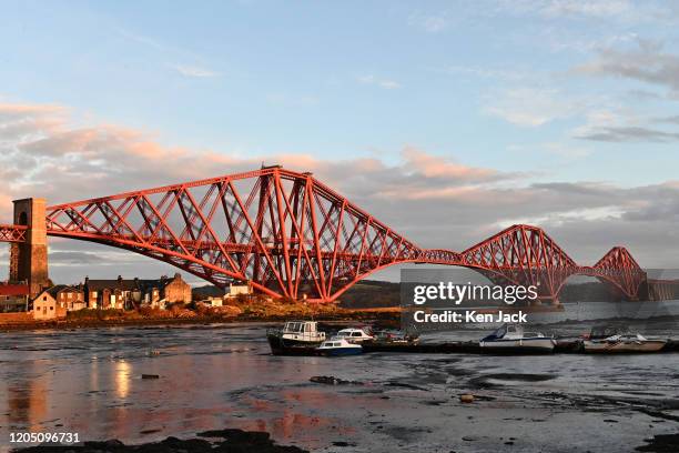 Evening sun catches the iconic Forth Bridge on the 130th anniversary of its opening on March 4 by the Duke of Rothesay, the future King Edward VII,...