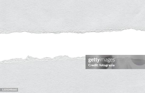 white paper tears - at the edge of stock pictures, royalty-free photos & images