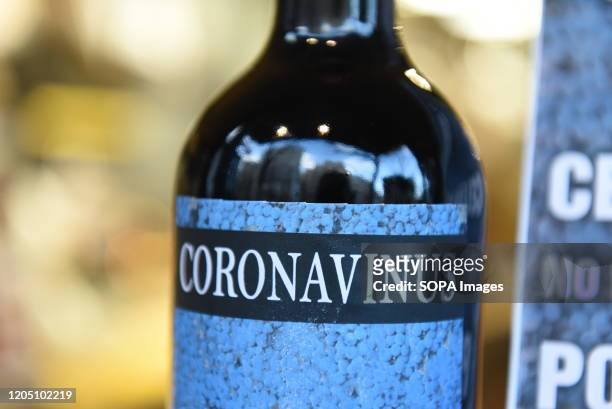 Coronavirus wine bottles for sale at 'La tienda del Espia' shop in Madrid. The store markets Coronavirus brand wine for customers, who are not...