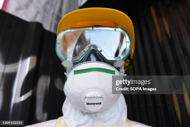 Health protection mask for sale at 'La tienda del Espia' shop in Madrid. The store markets Coronavirus brand wine for customers, who are not infected...