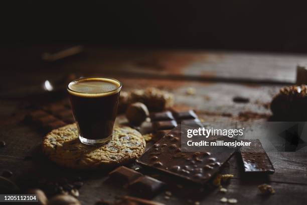 chocolate chip cookie, espresso on wooden background - coffee with chocolate stock pictures, royalty-free photos & images