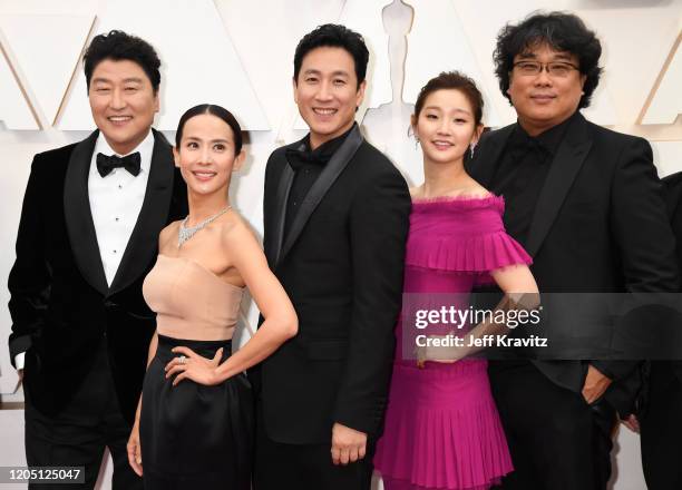 Director Bong Joon-ho with cast and crew of "Parasite" attend the 92nd Annual Academy Awards at Hollywood and Highland on February 09, 2020 in...