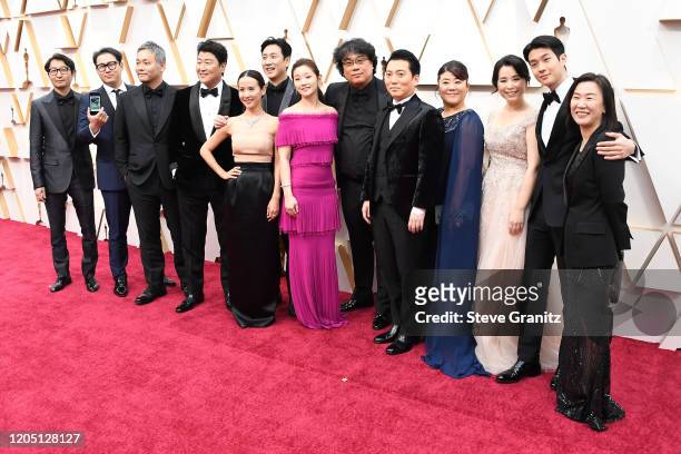 Parasite cast and crew attends the 92nd Annual Academy Awards at Hollywood and Highland on February 09, 2020 in Hollywood, California.