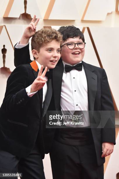 Roman Griffin Davis and Archie Yates attend the 92nd Annual Academy Awards at Hollywood and Highland on February 09, 2020 in Hollywood, California.