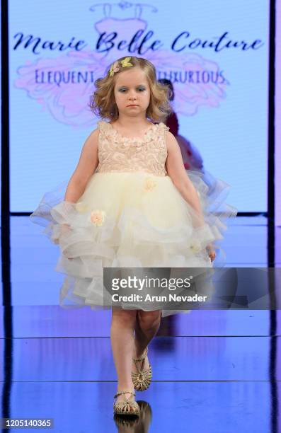 Model walks the runway during Marie Belle Couture At New York Fashion Week Powered By Art Hearts Fashion NYFW 2020 at The Angel Orensanz Foundation...