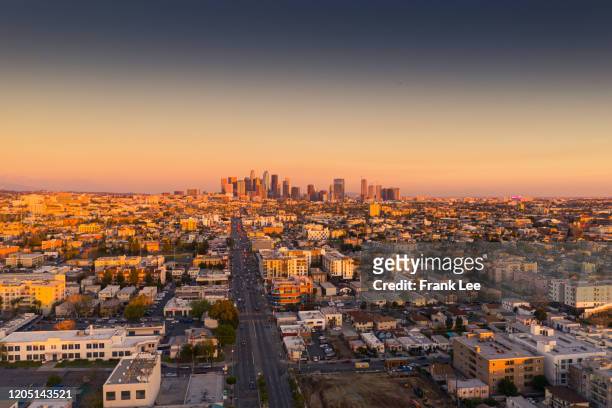 los angeles downtown aerial view at sunset - downtown los angeles aerial stock pictures, royalty-free photos & images