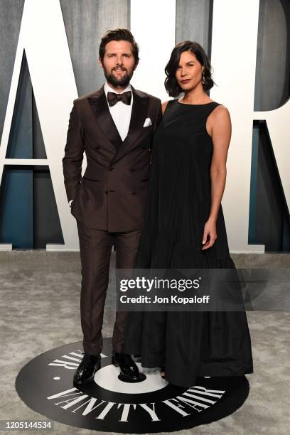 Adam Scott and Naomi Scott attends the 2020 Vanity Fair Oscar Party hosted by Radhika Jones at Wallis Annenberg Center for the Performing Arts on...