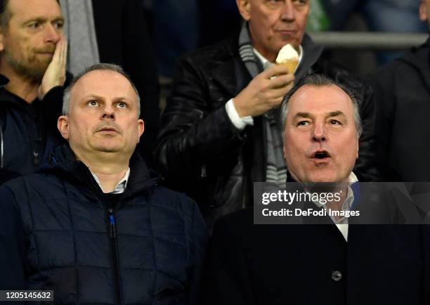 Chief of sport Jochen Schneider of FC Schalke 04 and chairman of the supervisory board Clemens Toennies of FC Schalke 04 look on prior to the DFB Cup...