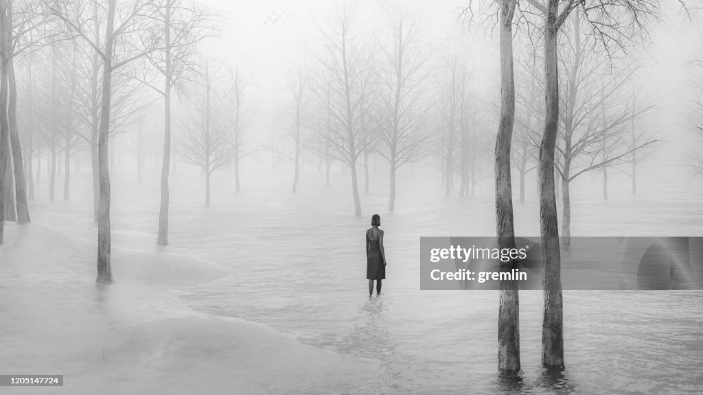 Young woman walking in fantasy winter landscape