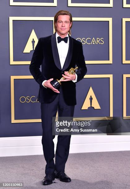 Brad Pitt, winner of the Actor in a Supporting Role award for “Once upon a Time...in Hollywood,” poses in the press room during the 92nd Annual...
