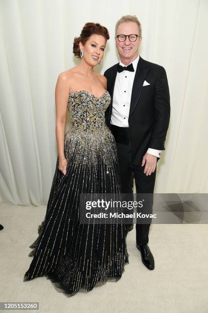 Hilary Roberts and Stephen Watson attend the 28th Annual Elton John AIDS Foundation Academy Awards Viewing Party sponsored by IMDb, Neuro Drinks and...