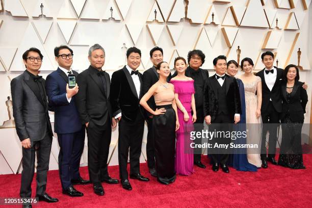 Cast and crew of 'Parasite' including editor Yang Jin-mo, writer Jin Won Han, producer Kwak Sin-ae, production designer Ha-jun Lee, Yang-kwon Moon,...