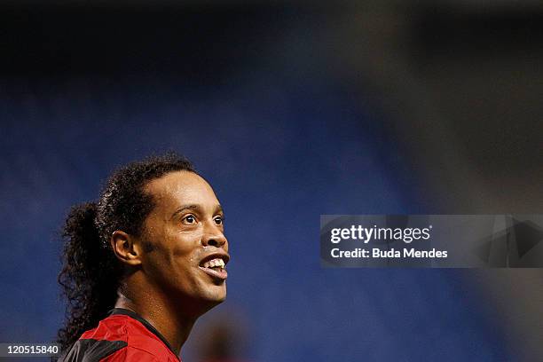 Ronaldinho of Flamengo celebrates a scored goal againist Coritiba during a match as part of Serie A 2011 at Engenhao stadium on August 06, 2011 in...