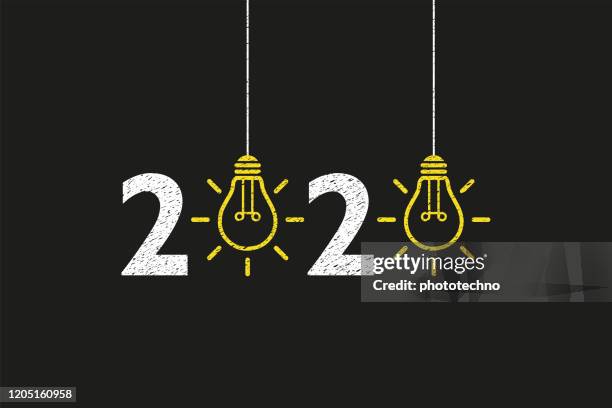 drawing new year 2020 idea concepts on blackboard background - 2020 goals vector stock illustrations