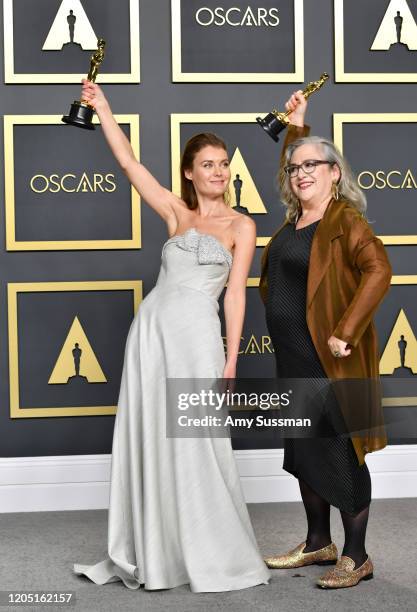 Directors Carol Dysinger and Elena Andreicheva, winners of the Documentary Feature award for “Learning to Skateboard in a Warzone ,” pose in the...