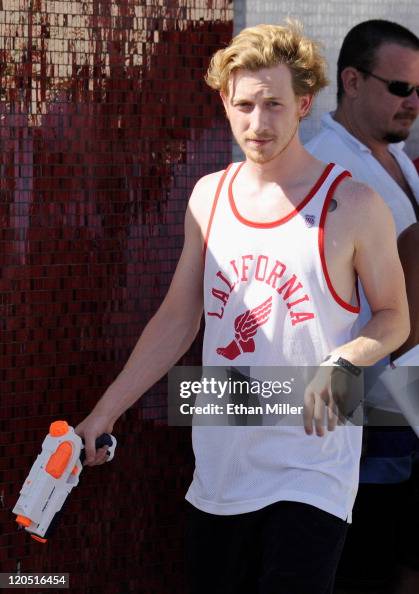 Asher Roth The Rapper Rapper Asher Roth holds a water gun as he performs at the Moorea ...