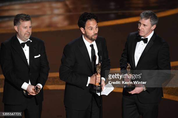 Greg Butler, Guillaume Rocheron, and Dominic Tuohy accept the Visual Effects award for '1917' onstage during the 92nd Annual Academy Awards at Dolby...