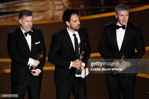 Greg Butler, Guillaume Rocheron, and Dominic Tuohy accept the Visual Effects award for '1917' onstage during the 92nd Annual Academy Awards at Dolby...