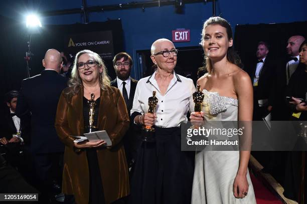 In this handout photo provided by A.M.P.A.S. Oscar winners Carol Dysinger, Jeff Reichert, Julia Reichert, and Elena Andreicheva pose backstage during...
