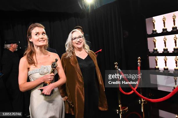 In this handout photo provided by A.M.P.A.S. Best Documentary winners Elena Andreicheva and Carol Dysinger pose backstage during the 92nd Annual...