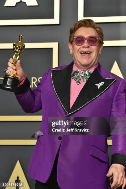 Musician Elton John, winner of the Original Song award for " Love Me Again" from "Rocketman," poses in the press room during the 92nd Annual Academy...