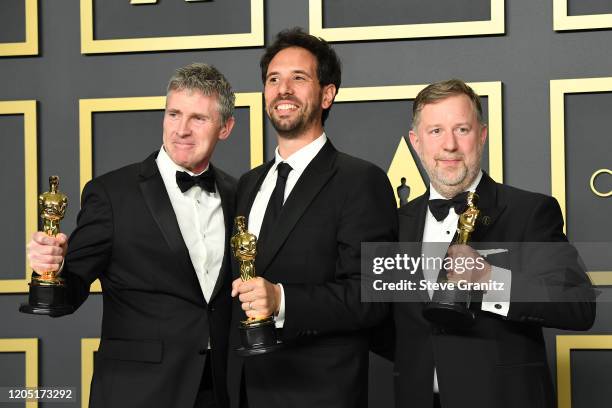 Dominic Tuohy, Guillaume Rocheron and Greg Butler, winners of the Visual Effects award for “1917,” pose in the press room during the 92nd Annual...