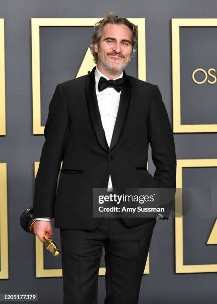 Joaquin Phoenix, winner of the Actor in a Leading Role award for “Joker,” poses in the press room during the 92nd Annual Academy Awards at Hollywood...