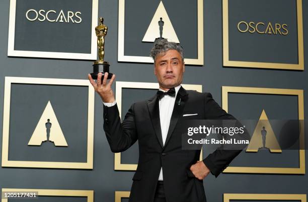 Taika Waititi, winner of Best Adapted Screenplay for "Jojo Rabbit," poses in the press room during the 92nd Annual Academy Awards at Hollywood and...