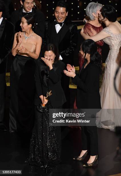Kwak Sin-ae and interpreter Sharon Choi accept the Best Picture award for 'Parasite' onstage during the 92nd Annual Academy Awards at Dolby Theatre...