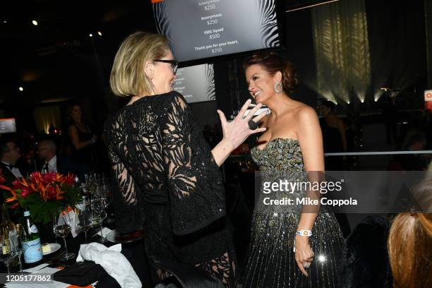 Sharon Stone and Hilary Roberts attend the 28th Annual Elton John AIDS Foundation Academy Awards Viewing Party sponsored by IMDb, Neuro Drinks and...
