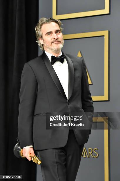 Joaquin Phoenix, winner of the Actor in a Leading Role award for "Joker," poses in the press room during the 92nd Annual Academy Awards at Hollywood...