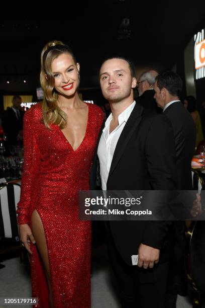 Josephine Skriver and Alexander DeLeon attend the 28th Annual Elton John AIDS Foundation Academy Awards Viewing Party sponsored by IMDb, Neuro Drinks...