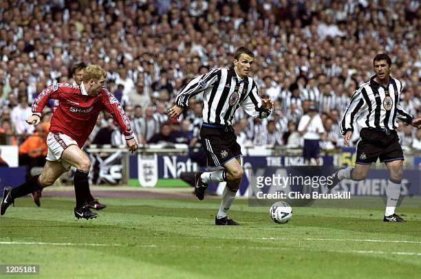 Dietmar Hamann of Newcastle United in action against Paul Scholes of Manchester United during the AXA FA Cup Final match against Manchester United...