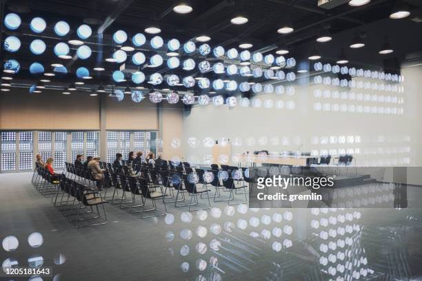 group of business people in the convention center - large conference event stock pictures, royalty-free photos & images