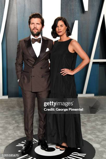 Adam Scott and Naomi Scott attend the 2020 Vanity Fair Oscar party hosted by Radhika Jones at Wallis Annenberg Center for the Performing Arts on...