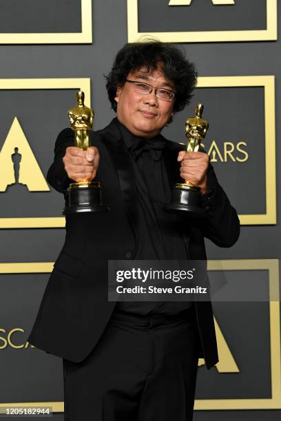 Director Bong Joon-ho, winner of the Original Screenplay, International Feature Film, Directing, and Best Picture award for “Parasite,” pose in the...