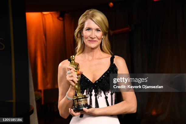 Laura Dern poses with the award for Best Actress in a Supporting Role for "Marriage Story" attends the 92nd Annual Academy Awards Governors Ball at...