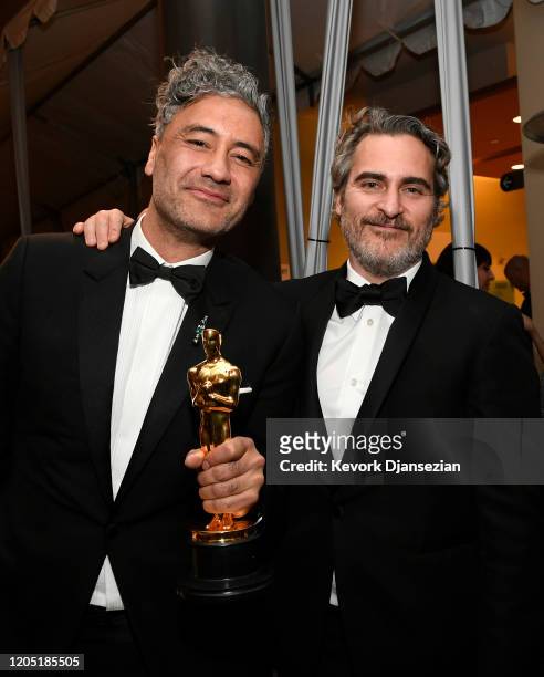 Director Taika Waititi, winner of the Adapted Screenplay award for “Jojo Rabbit” and Joaquin Phoenix, winner of the Actor in a Leading Role award for...