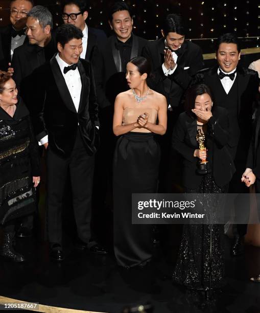 Miky Lee, Kang-ho Song, Lee Sun-kyun, Cho Yeo-jeong, Choi Woo-shik, and Kwak Sin-ae accept the Best Picture award for 'Parasite' onstage during the...